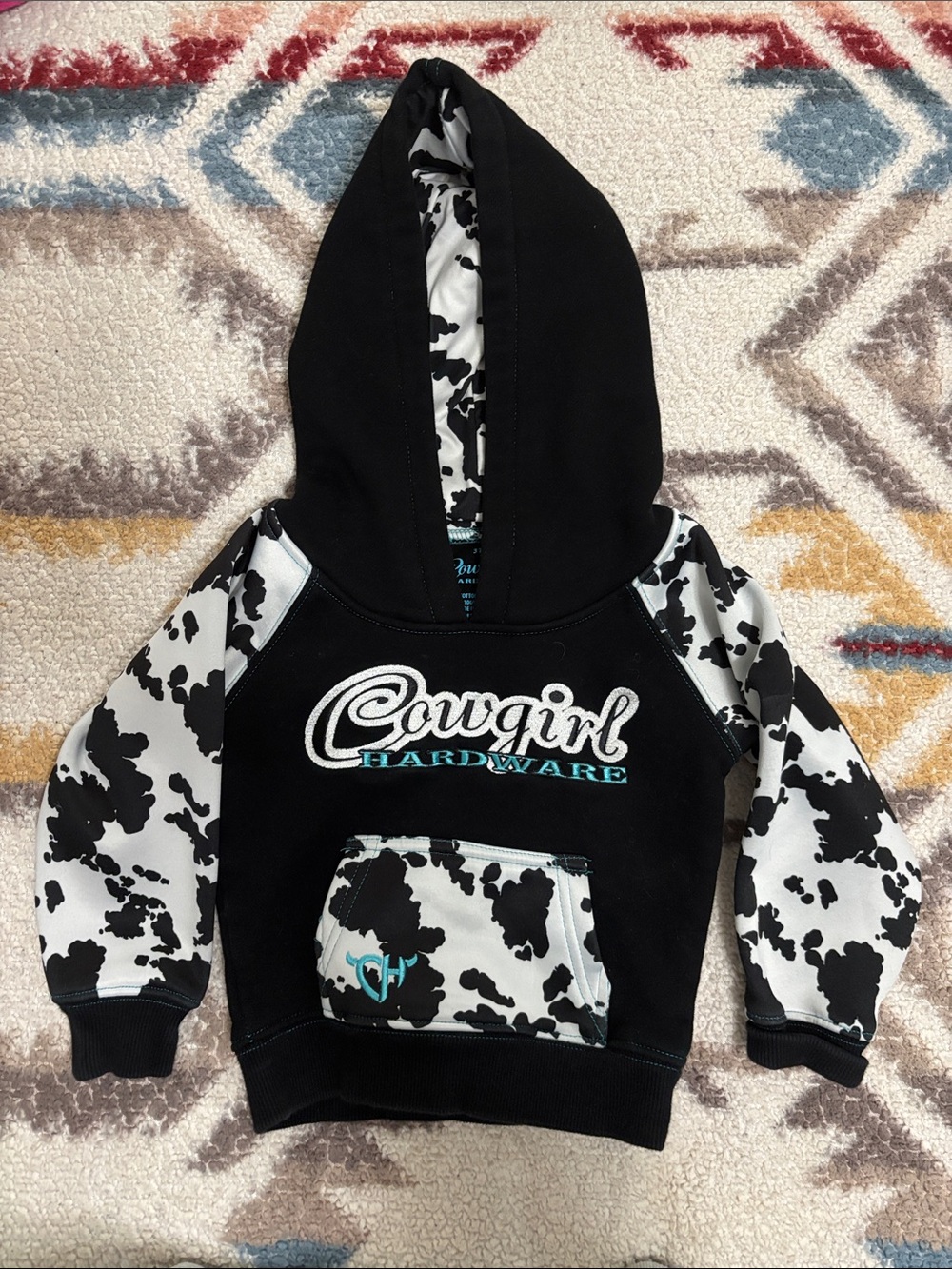 Cowgirl Hardware Black Hooded Pullover with Cowprint Sleeves